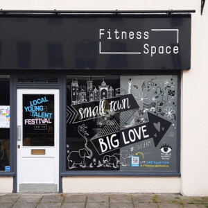 Small Town, Big Love mural for an empty shop window in Leamington Spa Small Town, Big Love mural for an empty shop window in Leamington Spa