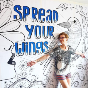 Motivational mural with bird motif and custom lettering Spread your wings mural with bird and lettering