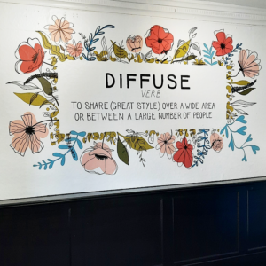 Hand-painted signage for Diffuse Retail in Warwick Floral mural with hand-painted lettering